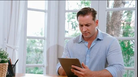 Businessman struggle to solve work problem from home. Synchronos 스톡 사진