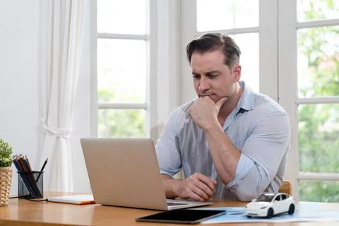 Businessman struggle to solve work problem from home. Synchronos 스톡 사진