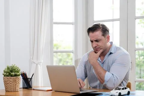 Businessman struggle to solve work problem from home. Synchronos 스톡 사진