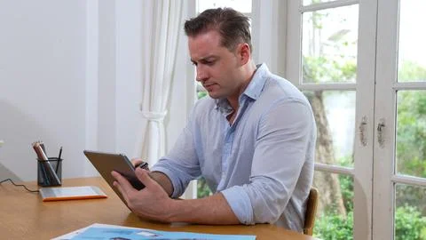 Businessman struggle to solve work problem from home. Synchronos 스톡 사진