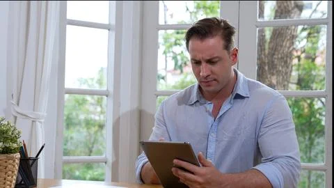 Businessman struggle to solve work problem from home. Synchronos 스톡 사진