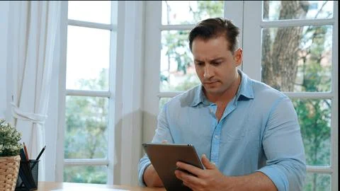 Businessman struggle to solve work problem from home. Synchronos 스톡 사진