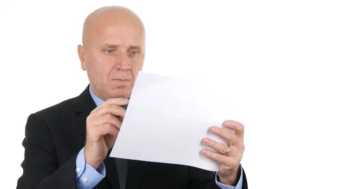 Businessman Study Analyze and Make Notes Keeping a Business Document in Hand Video stock 107877885