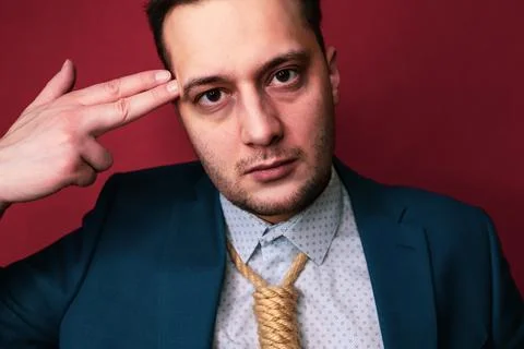 Businessman in suit with Lynch loop instead of tie over neck. Stock Photos