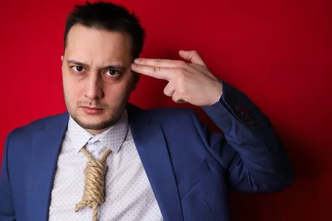 Businessman in suit with Lynch loop instead of tie over neck. Stock Photos