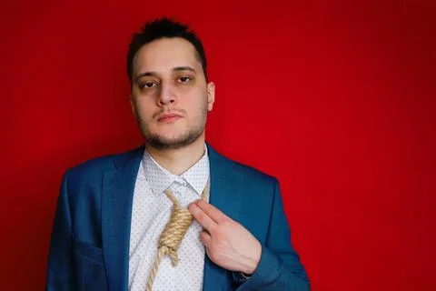 Businessman in suit with Lynch loop instead of tie over neck. Stock Photos