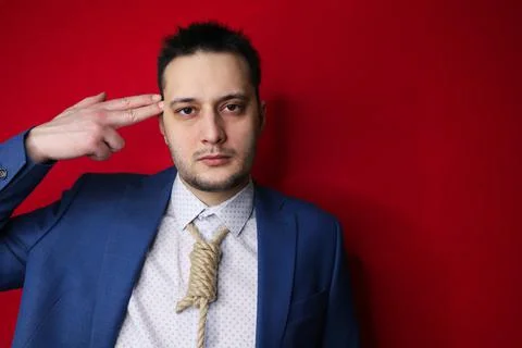 Businessman in suit with Lynch loop instead of tie over neck. Stock Photos