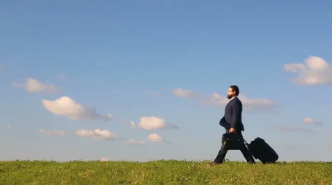 Businessman with suitcase Stock Footage 67694530