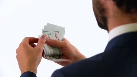 Businessman in Suits Counting Bunch of USD Dollar Money Video stock 76514939