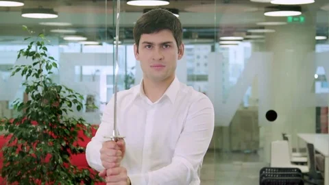 Businessman with sword 스톡 동영상 75158649