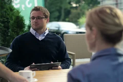 Businessman with tablet computer gets coffee in the cafe NTSC Stock Footage 11873894