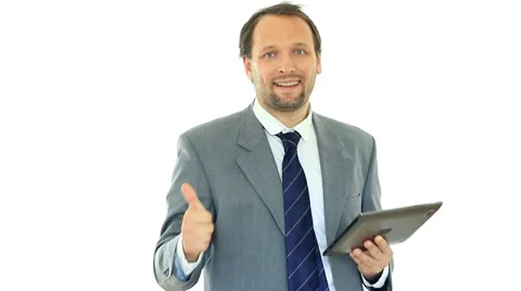 Businessman with tablet computer showing thumbs up, ok sign, isolated HD Stock Footage 8552682