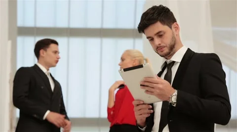 Businessman with the Tablet Stock Footage 42259277