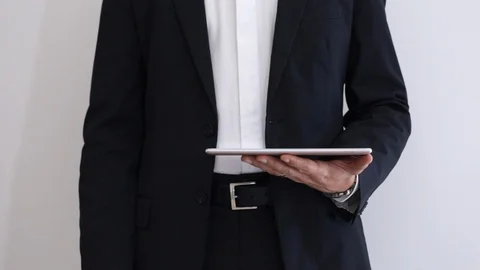Businessman with tablet Video stock 104600607
