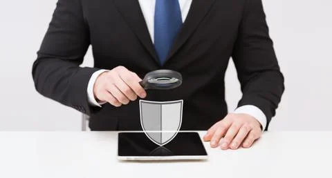 Businessman with tablet pc antivirus program icon Stock Photos