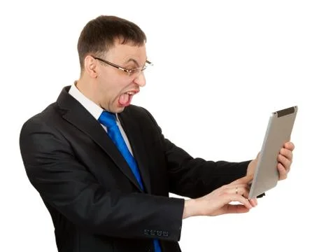 Businessman with a tablet pc hamming Stock Photos