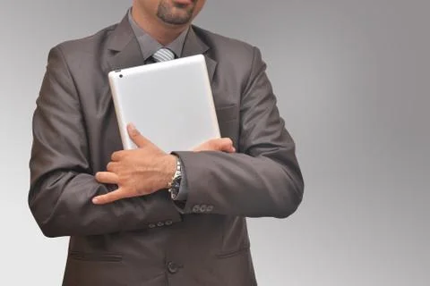 Businessman with tablet Stock Photos