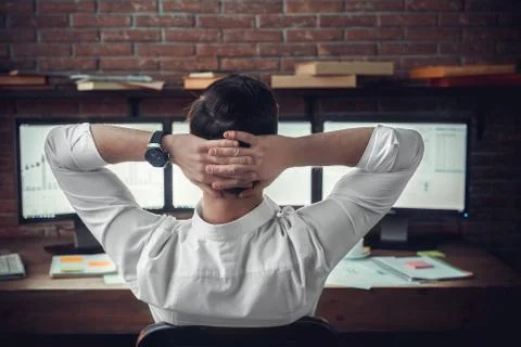 Businessman taking break after computer work, thinking of problem solution Stock Photos