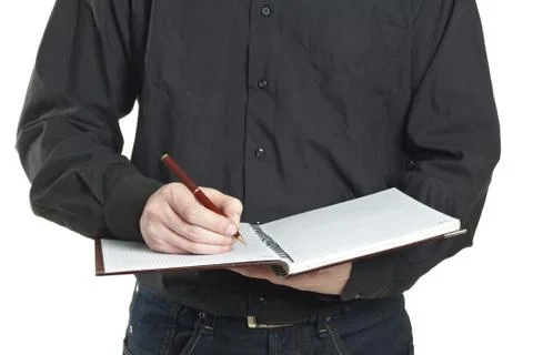 Businessman taking note in a notepad Stock Photos