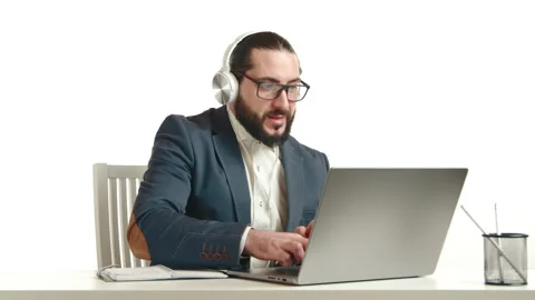 Businessman Taking Notes and Working on Laptop, Organized Workflow Stock Footage 266035281