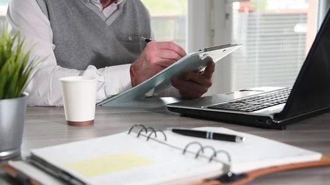 Businessman taking notes on clipboard Stock Footage 108968648