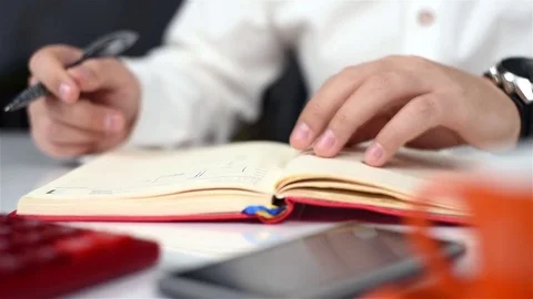 Businessman Taking Notes Stock Footage 70718739