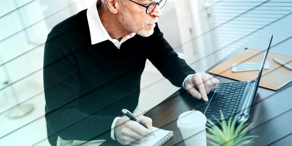 Businessman taking notes on notebook, geometric pattern Stock Photos