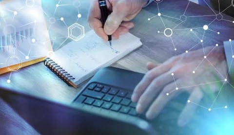 Businessman taking notes on notebook; light effect 스톡 사진