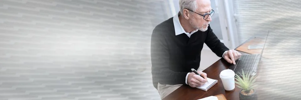 Businessman taking notes on notebook; panoramic banner Stock Photos