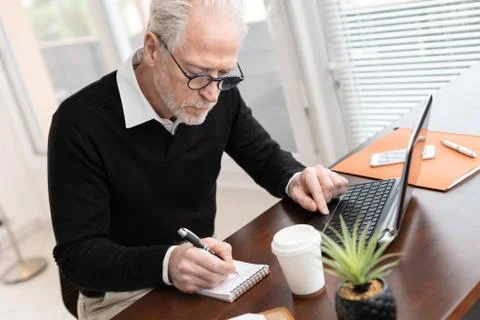 Businessman taking notes on notebook 写真素材