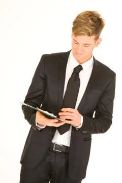 Businessman taking notes Stock Photos