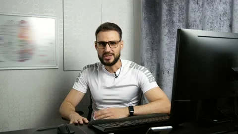 Businessman talking to camera making video chat for remote job interview. young Stock Footage 202608769
