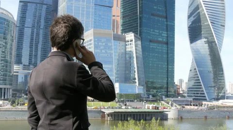 Businessman talking on cell Stock Footage 51313517