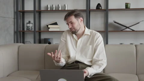 Businessman Talking During Video Call On Laptop In Modern Office Stock Footage 344696800