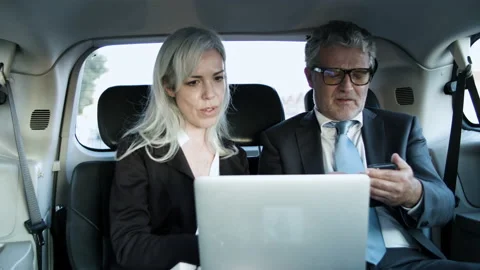 Businessman talking to his assistant while calling to partner. Stock Footage 153318107