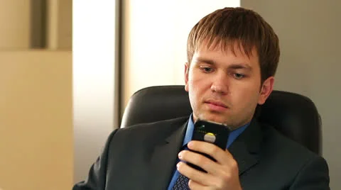 Businessman talking on the phone Stock Footage 24853325