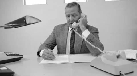 Businessman talking on the phone Stock Footage 61672002