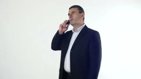 Businessman talking on the phone Stock Footage 68156161