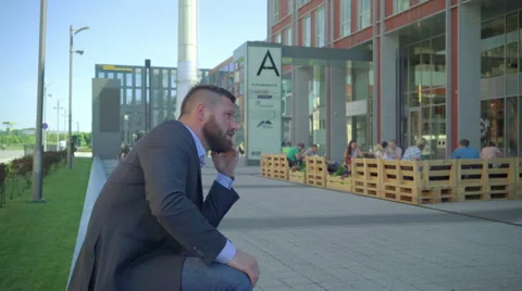 Businessman talking by smartphone Stock Footage 66297052