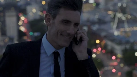 Businessman talking on smartphone Stock Footage 106320663