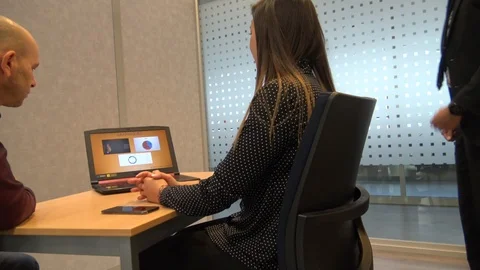 Businessman Talks About Graphics On Computer Stock Footage 121614952