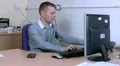 Businessman talks on his work phone HD Footage