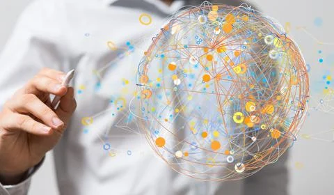 Businessman tapping on a digital render of a floating orange global network Stock Photos