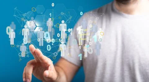 Businessman tapping on a floating render of a network of profile icons and binar Stock Photos