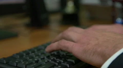 Businessman tapping on a keyboard Stock Footage 68770371