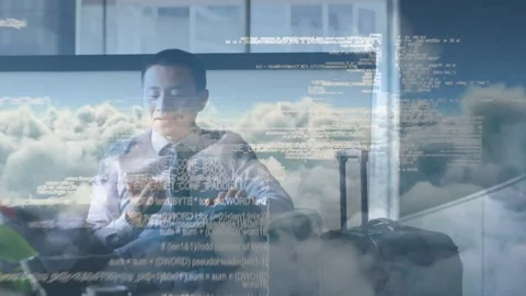 Businessman tapping phone, checking flight, initiating cloud code overlays over Stock Footage 333704635