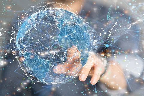 Businessman tapping a render of a digital global network Stock Photos