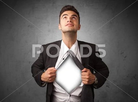 Businessman tearing off his shirt with white copyspace on chest Stock Photos
