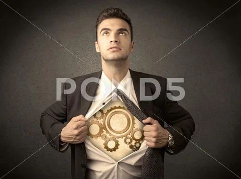 Businessman tearing shirt off and machine cog wheel shows Stock Photos