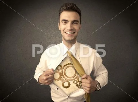 Businessman tearing shirt off and machine cog wheel shows Stock Photos